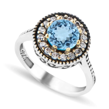 Pierścień z błękitnym topazem - orientalny wzór