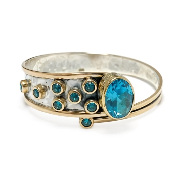 Bransoletka srebrna z owalnym błękitnym topazem - Wyprawa przez orient