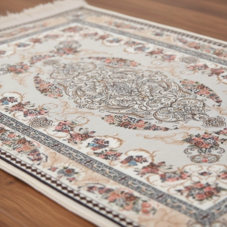 Dywanik dekoracyjny z frędzlami 45x30 cm z kwiatowym ornamentem