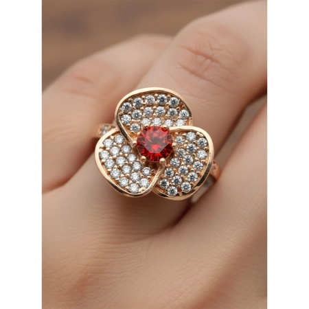 Pierścionek srebrny w kształcie kwiatu z granatem