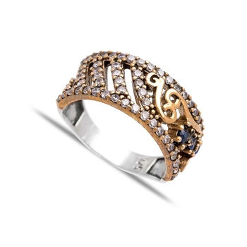 Subtelny pierścionek z szafirami i cyrkoniami