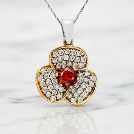 Naszyjnik srebrny z granatem i cyrkoniami w kształcie kwiatu