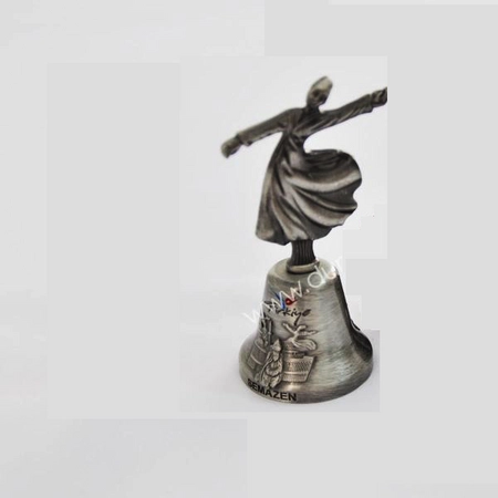 Osmański, mosiężny dzwonek z tureckim derwiszem