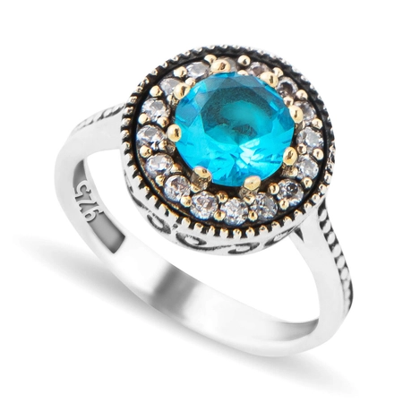Pierścień z błękitnym topazem - orientalny wzór