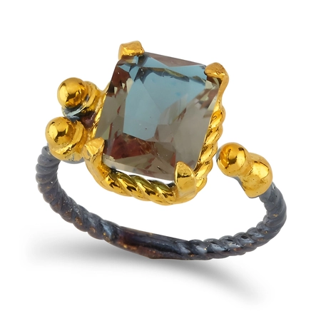 Srebrny pierścionek z prostokątnym zultanitem - W złotych szponach orientu
