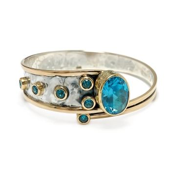 Bransoletka srebrna z owalnym błękitnym topazem - Wyprawa przez orient