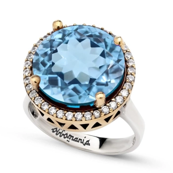 Srebrny okrągły pierścionek z błękitnym topazem