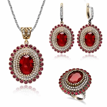 Srebrny masywny komplet z granatem