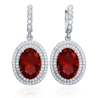 Srebrne owalne kolczyki z granatem