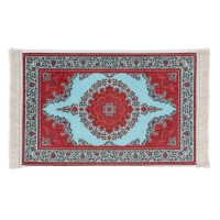 Dywanik dekoracyjny z frędzlami 45x30 cm - błękitny z czerwonym medalionem